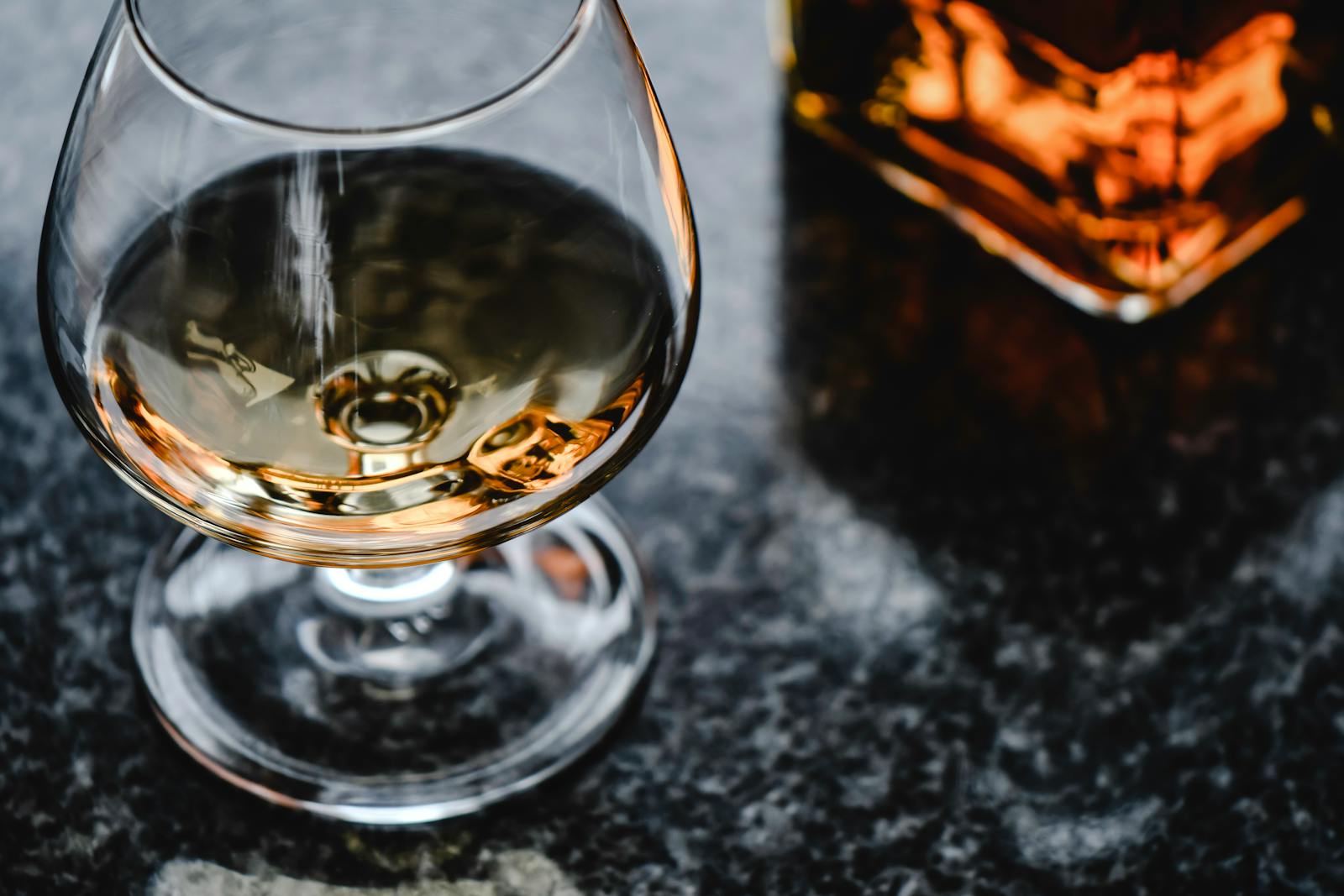 Close-Up Photo of Brown Liquor in a Glass