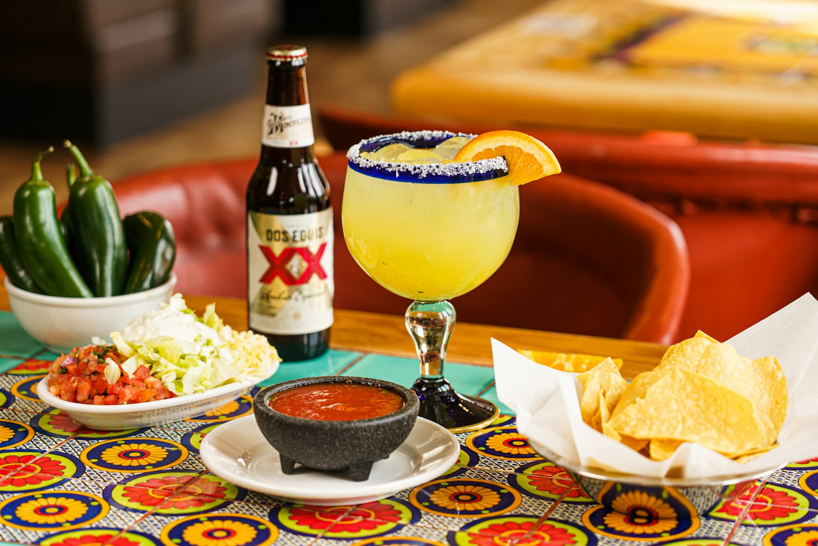 a table topped with plates of food and drinks